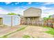 Backyard with a storage shed and a partially fenced yard at 148 S 3Rd Ave, Beech Grove, IN 46107