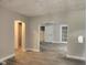 Open-concept living room with light-colored walls and modern flooring at 1624 E 30Th St, Indianapolis, IN 46218
