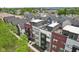 View of modern townhomes featuring rooftop decks and stylish exterior finishes at 1816 Rosette Way, Indianapolis, IN 46202