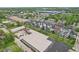 Aerial view of the community showcasing modern townhomes amidst lush greenery at 1816 Rosette Way, Indianapolis, IN 46202