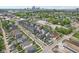 Aerial view of new construction homes in a neighborhood with city skyline in the distance at 1816 Rosette Way, Indianapolis, IN 46202