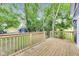 Large wooden back deck overlooking the yard with a storage shed at 1822 Howard St, Indianapolis, IN 46221