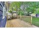 Spacious back deck with natural wood, surrounded by a lush green yard, perfect for outdoor enjoyment at 1822 Howard St, Indianapolis, IN 46221