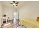 Bedroom with desk and wood floors at 1822 Howard St, Indianapolis, IN 46221