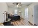Bedroom featuring wood floors and an attached bathroom at 1822 Howard St, Indianapolis, IN 46221