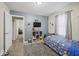 Bright bedroom decorated with colorful accents, providing a cheerful and functional space at 1907 N Drexel Ave, Indianapolis, IN 46218