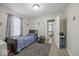 Well-designed bedroom offering comfort with a cozy bed, soft carpet, and playful decorations at 1907 N Drexel Ave, Indianapolis, IN 46218
