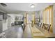 Inviting dining area with a large table, perfect for Gathering gatherings and dinner parties at 1907 N Drexel Ave, Indianapolis, IN 46218