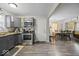 Open-concept kitchen connects with dining and living areas, perfect for modern living at 1907 N Drexel Ave, Indianapolis, IN 46218