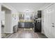 Well-equipped kitchen with stainless steel appliances and granite countertops at 1907 N Drexel Ave, Indianapolis, IN 46218