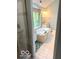 Bathroom featuring a soaking tub under a window and separate shower at 1941 Spruce Dr, Carmel, IN 46033