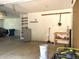 Two car garage with ample workspace and storage shelves at 1941 Spruce Dr, Carmel, IN 46033