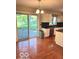 Well-lit eat-in kitchen with access to the backyard patio at 1941 Spruce Dr, Carmel, IN 46033