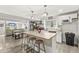 Bright eat-in kitchen with an island, stainless appliances, and wood countertops at 2 S 25Th Ave, Beech Grove, IN 46107