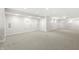 Spacious finished basement with neutral carpet and recessed lighting at 2070 Mustang Chase Dr, Carmel, IN 46074