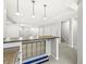Finished basement bar counter area with glass block and pendant lighting at 2070 Mustang Chase Dr, Carmel, IN 46074