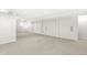 Finished basement space with neutral walls, carpet, and adjacent closet space at 2070 Mustang Chase Dr, Carmel, IN 46074