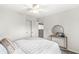 Bedroom with neutral tones, plush carpeting, and a ceiling fan at 2070 Mustang Chase Dr, Carmel, IN 46074