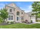 Charming two-story home with a brick facade, well-manicured lawn, and inviting curb appeal at 2070 Mustang Chase Dr, Carmel, IN 46074