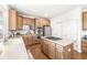 Spacious kitchen features stainless steel appliances, kitchen island with gas cooktop, and ample cabinet space at 2070 Mustang Chase Dr, Carmel, IN 46074