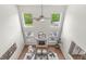 Bright living room featuring vaulted ceilings, fireplace and comfortable seating with lots of natural light at 2070 Mustang Chase Dr, Carmel, IN 46074