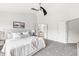 Spacious main bedroom with ensuite bathroom and plush carpeting at 2070 Mustang Chase Dr, Carmel, IN 46074