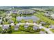 Bird's-eye view of a quiet neighborhood with a scenic pond, surrounded by lush greenery at 2337 Hanover Rd, Brownsburg, IN 46112