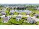 An aerial view of the neighborhood with a pond and fenced yards, perfect for a Gathering at 2337 Hanover Rd, Brownsburg, IN 46112