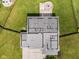 Aerial of the floor plan layout, shows layout for the first floor, garage, and outdoor living space at 2337 Hanover Rd, Brownsburg, IN 46112