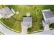 Aerial view showcasing a home's spacious backyard, complete with a patio and firepit area for outdoor enjoyment at 2337 Hanover Rd, Brownsburg, IN 46112