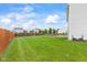Large backyard with a privacy fence, spacious lawn, outdoor seating and perfect for activities at 2337 Hanover Rd, Brownsburg, IN 46112