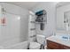 Bright bathroom featuring a shower/tub combo and a modern towel rack for storage at 2337 Hanover Rd, Brownsburg, IN 46112