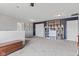 A second floor bonus room features gray walls and neutral carpeting at 2337 Hanover Rd, Brownsburg, IN 46112