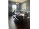 Dining room with a large wooden table, bench, and elegant decor at 2337 Hanover Rd, Brownsburg, IN 46112