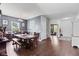 Elegant dining room featuring a wooden table, chandelier lighting, and hardwood floors at 2337 Hanover Rd, Brownsburg, IN 46112
