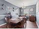 This dining room is spacious, with modern flooring and a decorative table at 2337 Hanover Rd, Brownsburg, IN 46112