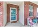 Charming front porch with brick accents, creating a welcoming entrance to the home at 2337 Hanover Rd, Brownsburg, IN 46112
