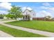 Charming home with lush green lawn, mature tree, and inviting curb appeal at 2337 Hanover Rd, Brownsburg, IN 46112