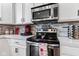 Modern kitchen with stainless steel appliances, sleek countertops, and stylish backsplash at 2337 Hanover Rd, Brownsburg, IN 46112