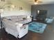 Comfortable living room featuring a sectional sofa and a stylish, patterned blue rug at 2337 Hanover Rd, Brownsburg, IN 46112
