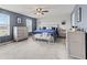 Spacious main bedroom with a ceiling fan, carpet, and lots of natural light at 2337 Hanover Rd, Brownsburg, IN 46112