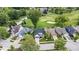 An aerial view shows homes in a residential neighborhood next to a golf course at 241 Chamberlain Cir, Noblesville, IN 46062