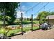 Outdoor space featuring cozy gravel area with string lights and a well-maintained lawn at 241 Chamberlain Cir, Noblesville, IN 46062