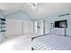Spacious bedroom features vaulted ceilings, multiple closets, and soft blue accent walls at 241 Chamberlain Cir, Noblesville, IN 46062
