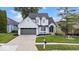 Charming two-story home with well-maintained lawn, updated windows and inviting curb appeal at 241 Chamberlain Cir, Noblesville, IN 46062