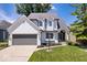 Charming two-story home with well-maintained lawn, updated windows and inviting curb appeal at 241 Chamberlain Cir, Noblesville, IN 46062