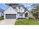 Charming two-story home with well-maintained lawn, updated windows and inviting curb appeal at 241 Chamberlain Cir, Noblesville, IN 46062