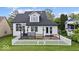 Charming two-story home with white picket fence and covered porch at 241 Chamberlain Cir, Noblesville, IN 46062