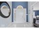 Bright and welcoming foyer featuring a stylish mirror and tile flooring at 241 Chamberlain Cir, Noblesville, IN 46062