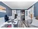 Comfortable home office with ample natural light, modern desk, and stylish decor at 241 Chamberlain Cir, Noblesville, IN 46062